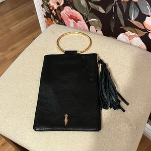 Black purse with gold